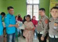 PWI Dan Satlantas Polres Mesuji Bagikan Sembako, Serta Sosialisasikan Kamseltibcarlantas