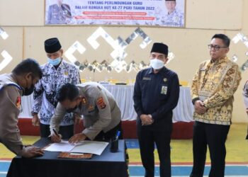 Polres Lampura Bersama PGRI MOU perlindungan hukum profesi guru