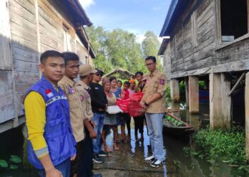Respon Cepat, Dinsos Mesuji Salurkan Bantuan Korban Banjir di Talang Gunung