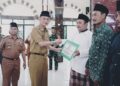 Penjabat Bupati Pringsewu Serahkan Bantuan Keagamaan Di 2 Kecamatan