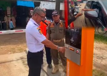 Dishub Mulai Terapkan Palang Pintu Parkir Otomatis di Pasar Mulya Asri