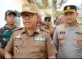 Didampingi Kapolres, Pj Bupati Mesuji Pantau Jalannya Pilkades Serentak
