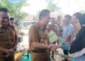 Wabup Lampura Serahkan 127 Sertifikat Tanah Di Desa Gunung Gijul