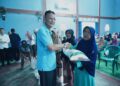 Pj.Bupati Pringsewu Salurkan Bantuan Pangan Beras di 2 Kecamatan