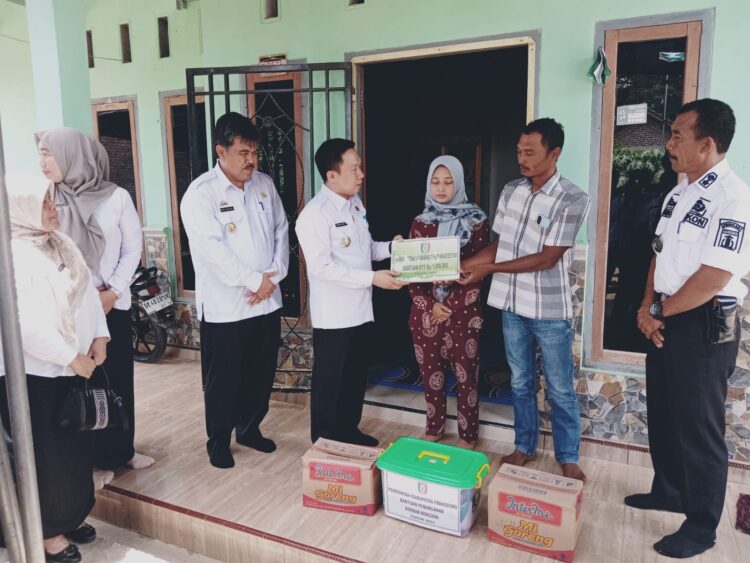 Pj.Bupati Pringsewu Serahkan Taliasih Korban Tenggelam di Sungai & Lakalantas