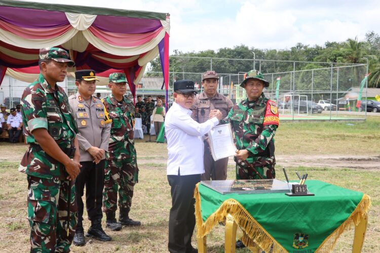 Kapolres dan Pj Bupati Mesuji Hadiri Upacara Penutupan TMMD di Desa Sungai Badak