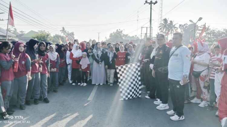 Ribuan Warga Tumijajar Antusias Ikuti Jalan Sehat HUT RI Ke 79