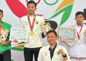 Tumbangkan Pesilat Tuan Rumah, Atlet Tanggamus M. Wildan Sukses Raih Medali Emas