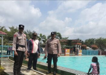 Anggota Polsek Way Serdang Lakukan Pengamanan Objek Wisata di Alun-alun Desa Hadi Mulyo