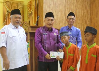 Kemenag Pringsewu Salurkan 175 Paket Santunan bagi Anak Yatim dan Penyandang Disabilitas