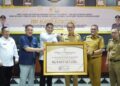 Pemkab Tubaba Terima Pemulihan Keuangan Negara Oleh Kejari.
