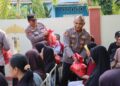 Baru Dilantik, Kapolres Pringsewu Langsung Blusukan dan Berbagi Sembako Dan Bendera