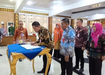 Disaksikan Wabup Romli, Disdukcapil MoU Hak Akses Data Bersama 9 OPD Di Lampura