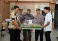 Kapolres Pringsewu Bawa Tumpeng ke Kejari, Perkuat Sinergi Penegakan Hukum