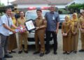 Lagi…Pemkab Lampura Terima Bantuan Mobil Ambulance Dari Bank Lampung