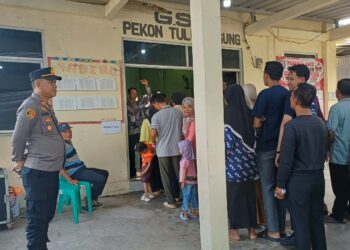 Polsek Gadingrejo Bersama TNI, Satpol PP dan Masyarakat Jaga Kondusivitas Pilkakon