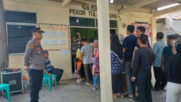 Polsek Gadingrejo Bersama TNI, Satpol PP dan Masyarakat Jaga Kondusivitas Pilkakon